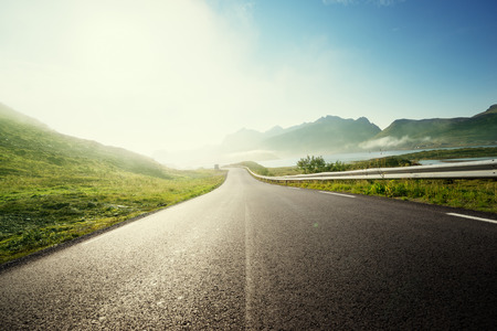 road and fog, Lofoten island, Norwayの写真素材