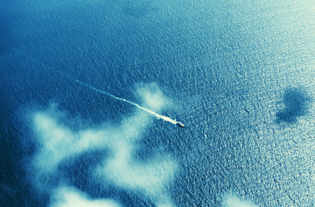Speed boat on the tropical sea, Seychellesの写真素材