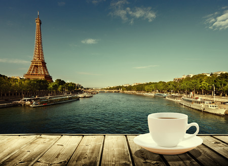 coffee on table and Eiffel tower in Parisの写真素材