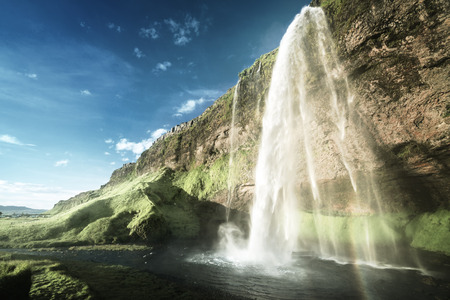 Seljalandsfoss waterfall at sunset, Icelandの写真素材