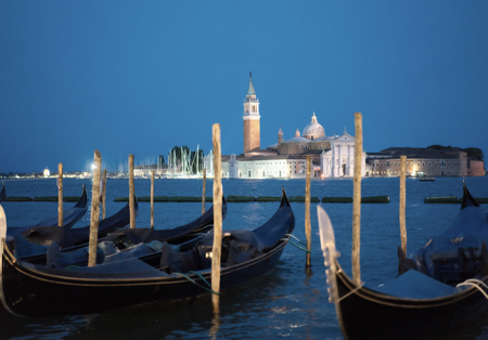 gondolal at night and San Giorgio Maggiore church, Piazza San Marco, Venice, Italyの写真素材