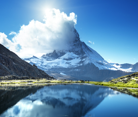 Reflection of Matterhorn in lake Riffelsee, Zermatt, Switzerlandの写真素材