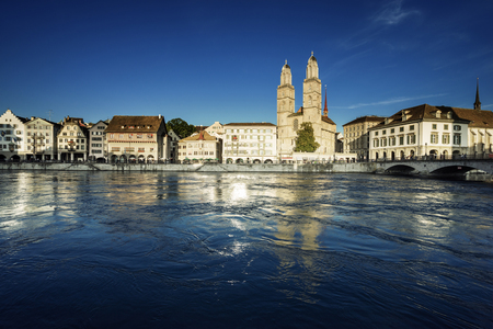 Zurich city center with famous Grossmunster and river Limmat, Switzerlandの写真素材