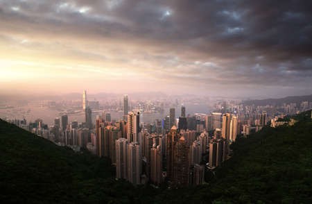 Sunset over Victoria Harbor from Victoria Peak in Hong Kongの写真素材