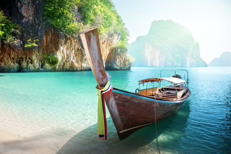 long boat on island in Thailandの写真素材