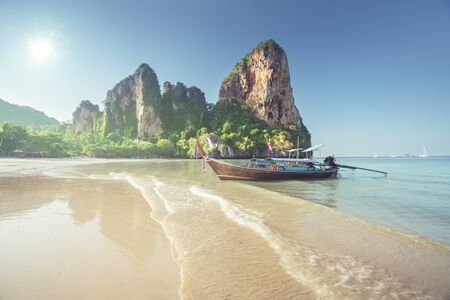 boats on Railay beach in Krabi Thailand の写真素材