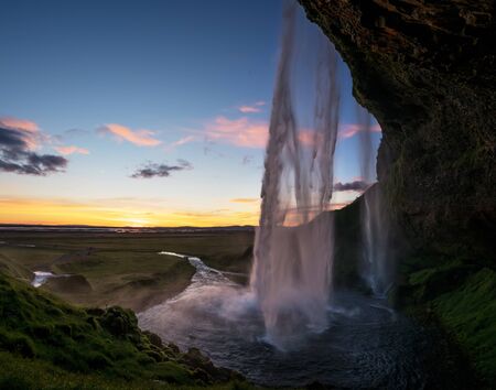 Seljalandsfoss waterfall at sunset, Icelandの写真素材