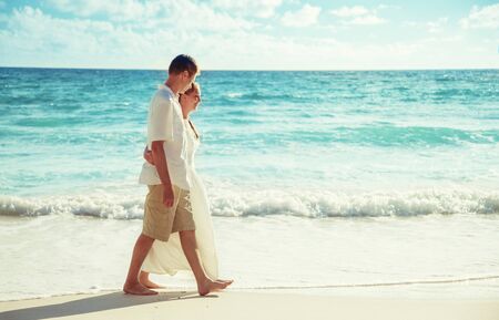 man and woman romantic couple on tropical beachの写真素材