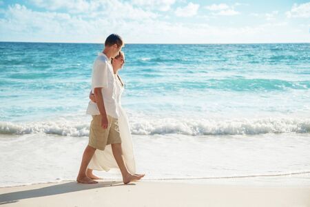man and woman romantic couple on tropical beachの写真素材