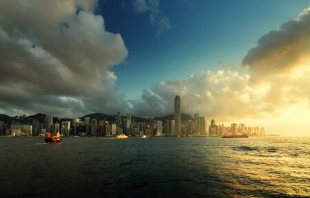Hong Kong harbour in sunset timeの写真素材