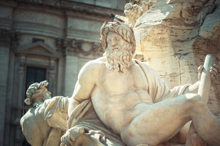 Statue of Zeus in Fountain, Piazza Navona, Rome, Italyの写真素材
