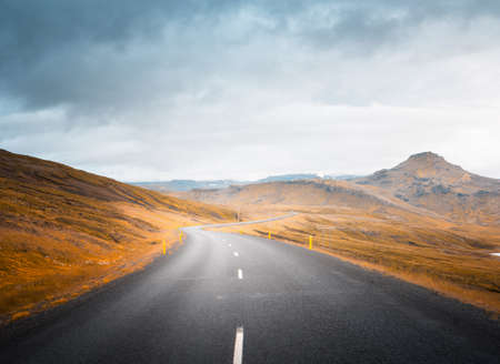 Icelandic landscape with asphalt roadの写真素材