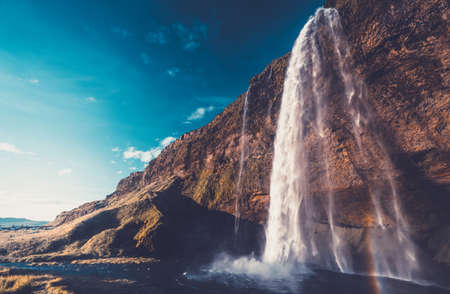 Seljalandsfoss waterfall at sunset, Icelandの写真素材