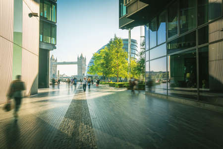 business people, modern buildings and Tower Bridge, London, UKのeditorial素材