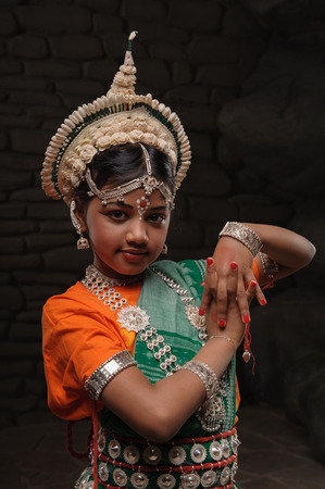 Cute little Indian girl in comely poseの写真素材