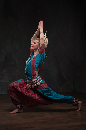 beautiful European girl , teaches national Indian danceの写真素材