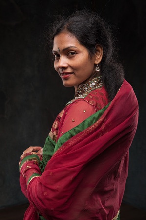 Indian portrait of a Mature woman on a dark background. Homemakersの写真素材
