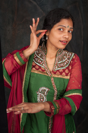 Indian woman dancing traditional danceの写真素材