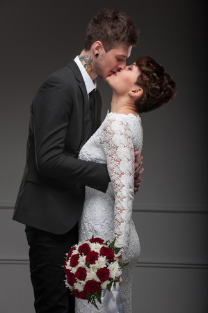 kiss bride and groom. Happy couple in loveの写真素材