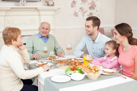 Family plays the important role in our lives. Lovely young married couple and their daughter are...