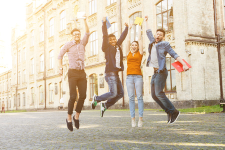 We have done it. Cheerful students are springing and laughing. They are raising arms and looking at...