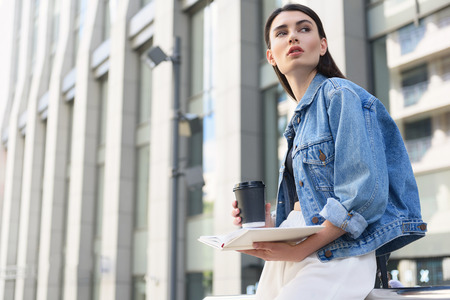 inspired woman look on the street with copy spaceの写真素材