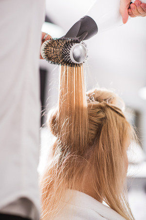 Male stylist is working at studioの写真素材