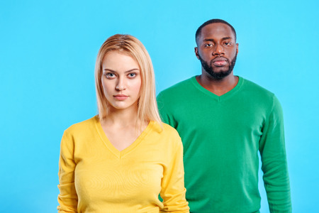 Young couple expressing their seriousnessの写真素材