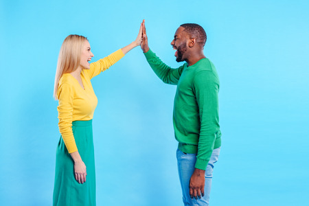 Joyful man and woman sharing their loveの写真素材