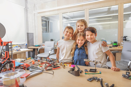 Hilarious children in light workshopの写真素材