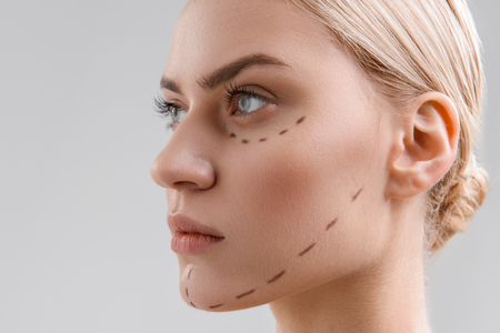 Serine girl is ready for facial surgeryの写真素材