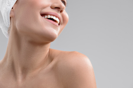 Happy girl likes skincare treatmentの写真素材