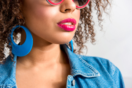 Serene african female with sunglassesの写真素材