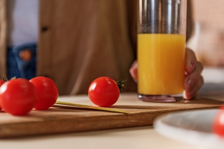 Mature woman with healthy vitamin drinkの写真素材