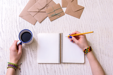 Woman keeping simple black pencilの写真素材