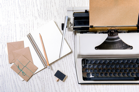 Open notebook near apparatus for writingの写真素材