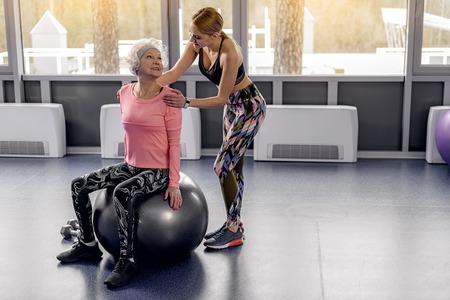 Cheerful granny engaging in pilatesの写真素材