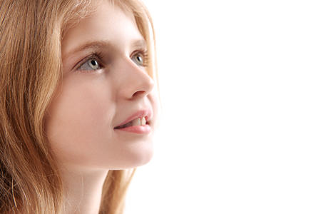 Interested small kid glancing upの写真素材