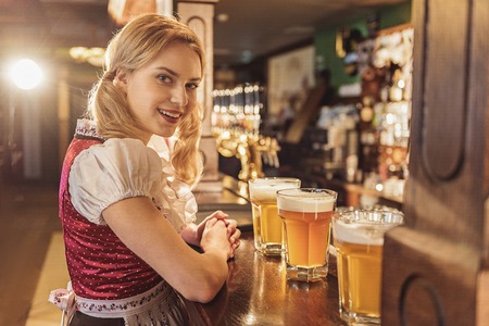 Outgoing woman having job in alehouseの写真素材
