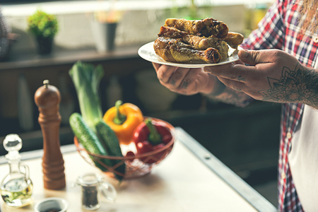 Fat man keeping appetite meatの写真素材