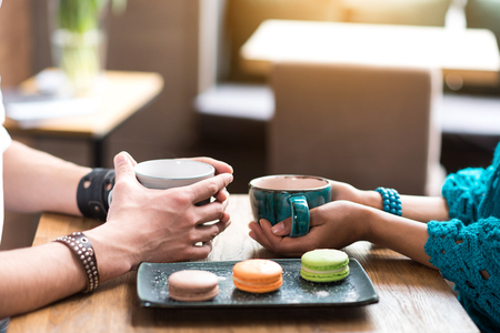 Man and woman eating sweet food on dateの写真素材