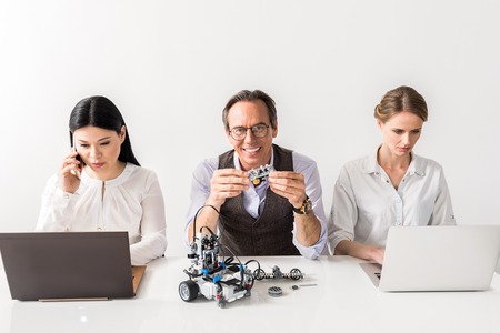 Pleasant colleagues are laboring togetherの写真素材