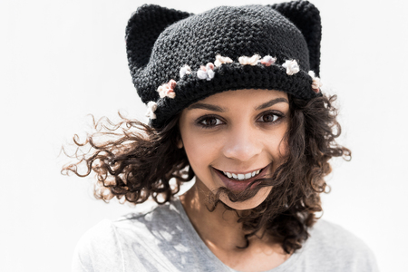 Charming cheerful girl is expressing gladnessの写真素材