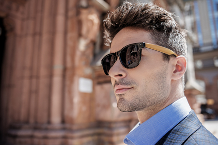 Assured male person wearing glassesの写真素材