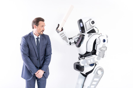 Grumpy android is threatening adult employeeの写真素材
