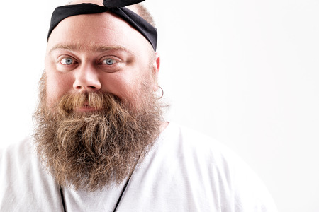 Cheerful male thick hipster expressing happinessの写真素材