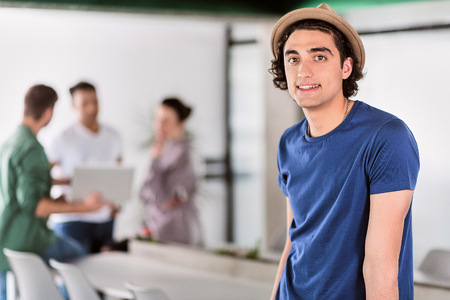 Confident male worker expressing positive emotionsの写真素材