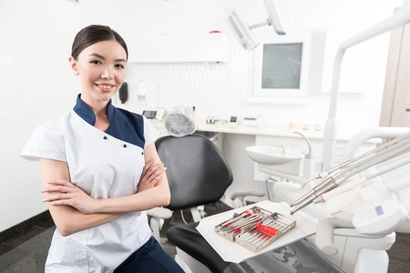 Outgoing stomatologist locating in dental roomの写真素材