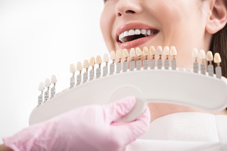 Stomatologist choosing right implants to clientの写真素材