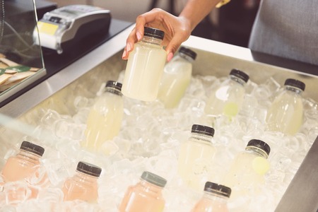 Girl is keeping product of organic storeの写真素材